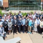 group photo outside Davis Hall at UB from the 2017 Erich Bloch Symposium. 