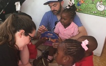 Jordan Walbesser reads to preschoolers in Nassau, Bahamas. 